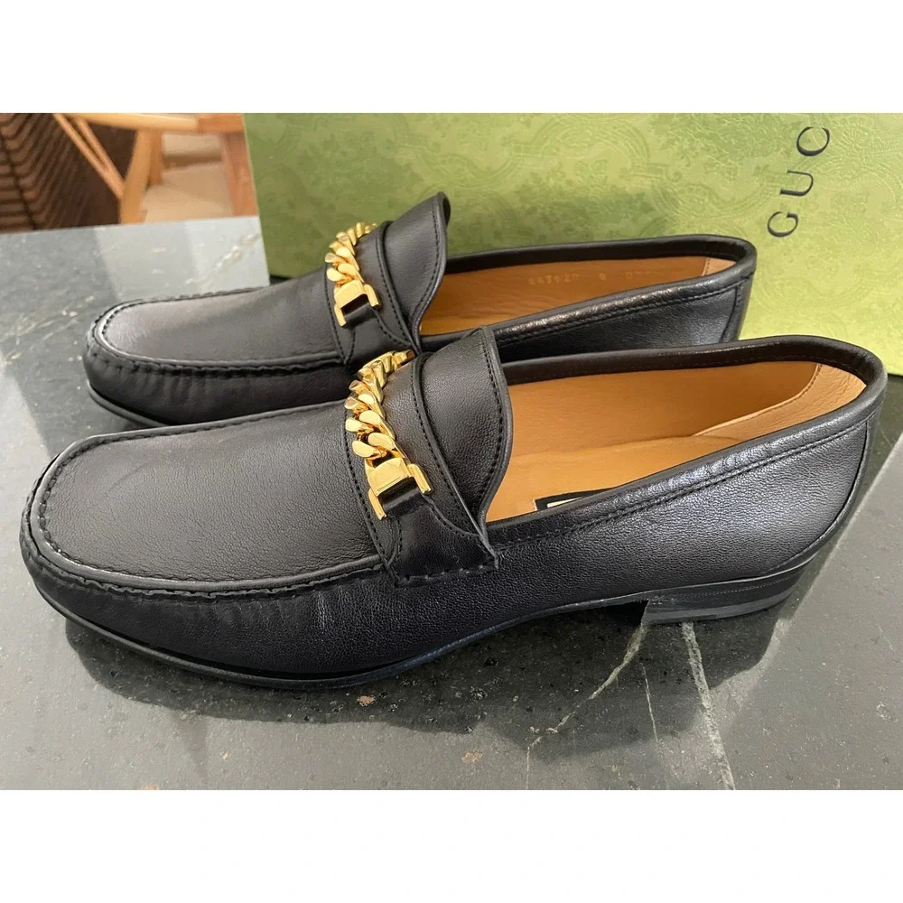 GUCCI 643620 black leather loafers with gold-tone chain horsebit, UK 8